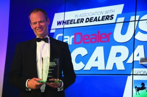 Black Horse managing director Chris Sutton hands out an award